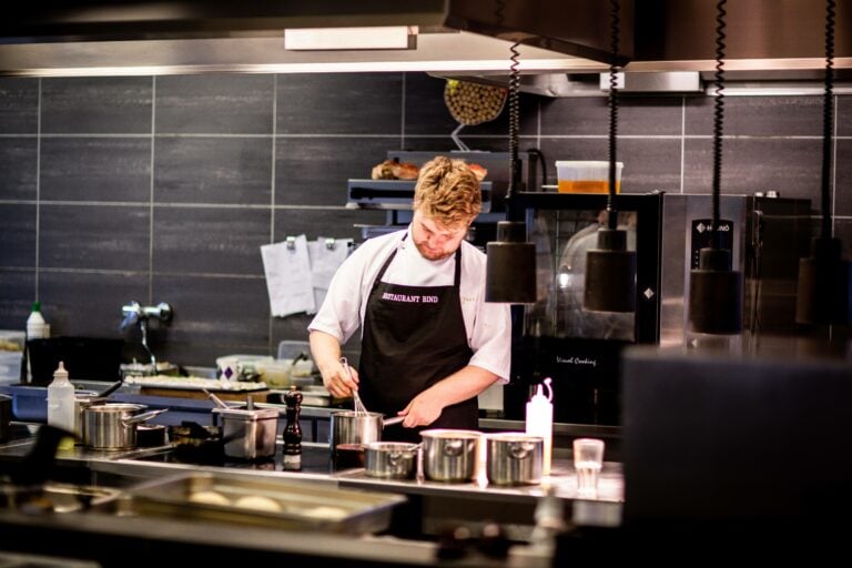 Man cooking in a commercial kitchen