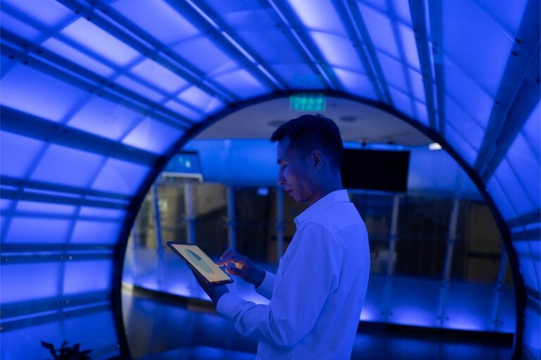 Man in a blue room