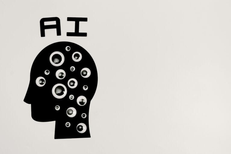 Cartoon head with the letters A I