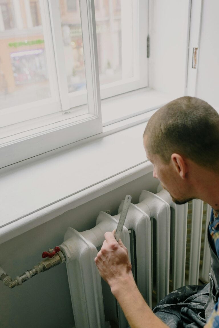 Man working on a radiator