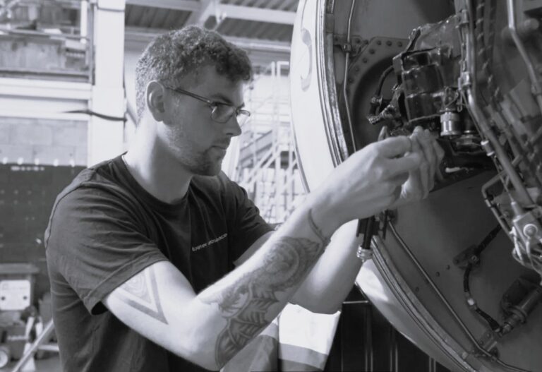 Man working on aeroplane