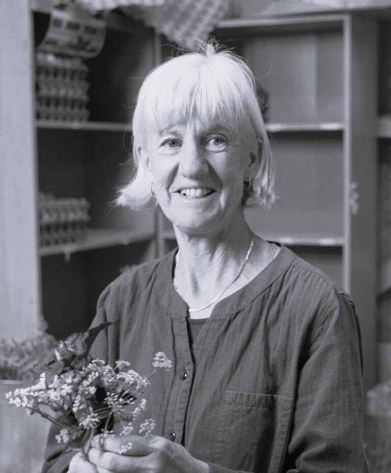 Image of woman holding flowers