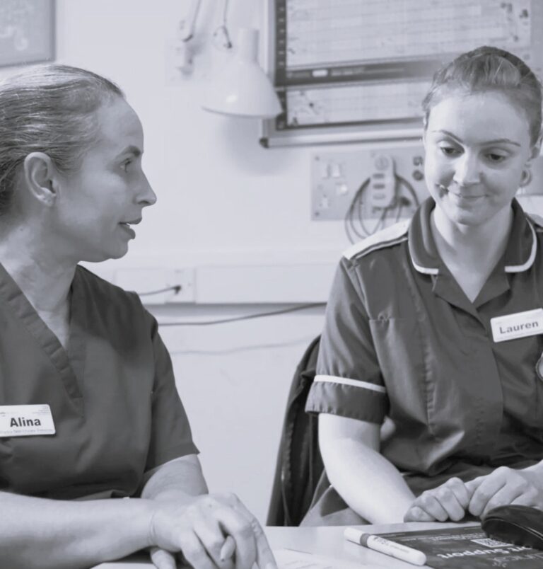 Two nurses talking